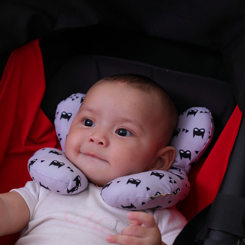 Skyddad huvud- och nackkudde för spädbarn